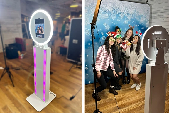 Modern photo booth with ring light and color-changing base.